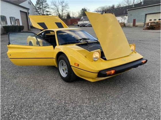 1977 Ferrari 308 GTB Restored Fly Yellow with a black interior
