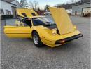 1977 Ferrari 308 GTB Restored Fly Yellow with a black interior