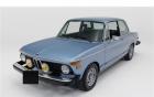 1974 BMW 2002 Tii Fjord Metallic over a blue interior